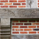 antique-bricks-with-engraved-timber